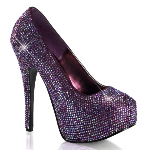 Zapatos de pedrería violeta...